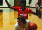 Bellville boy’s hoops holds off Sealy in OT thriller